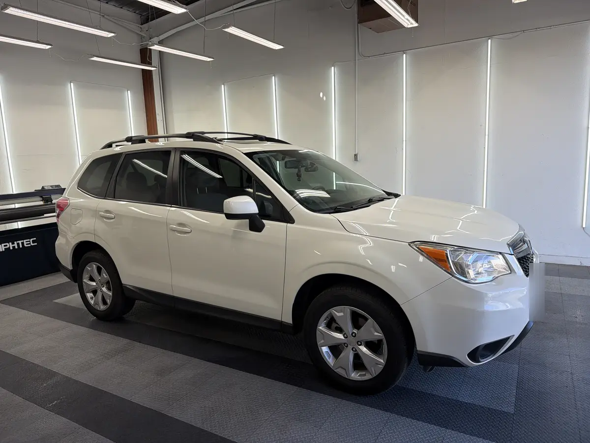 White Subaru Forester after Avery Dennison Encore Supreme ceramic window tint (view 1)