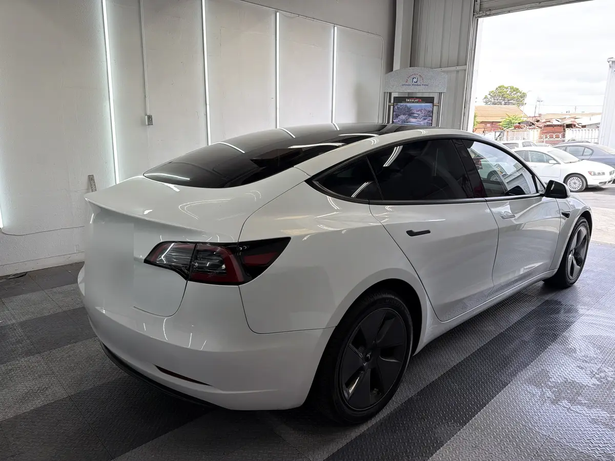 White Tesla Model 3 after Avery Dennison Encore Supreme ceramic window tint (view 3)