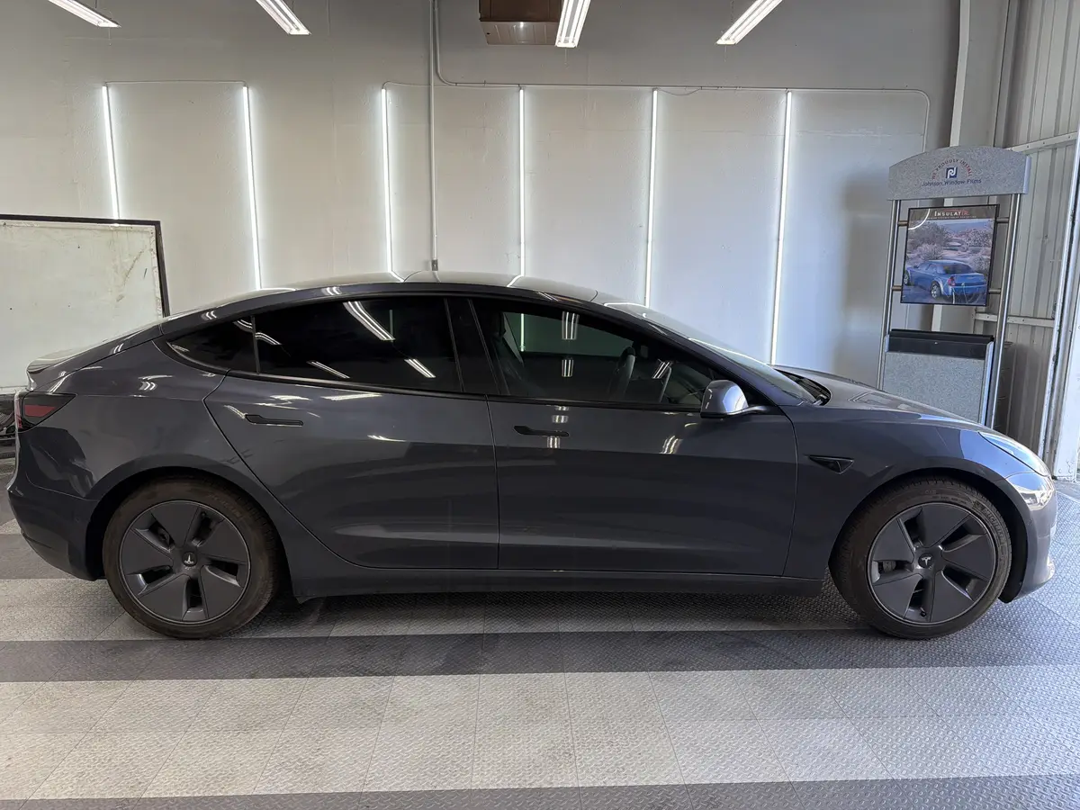 Gray Tesla Model 3 at Quality Window Tinting, ceramic window tint job (photo 2)