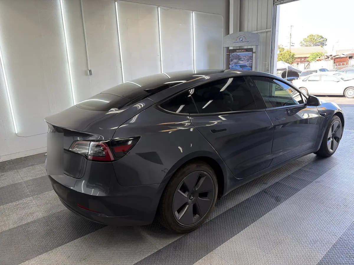 Gray Tesla Model 3 at Quality Window Tinting, ceramic window tint job (photo 3)