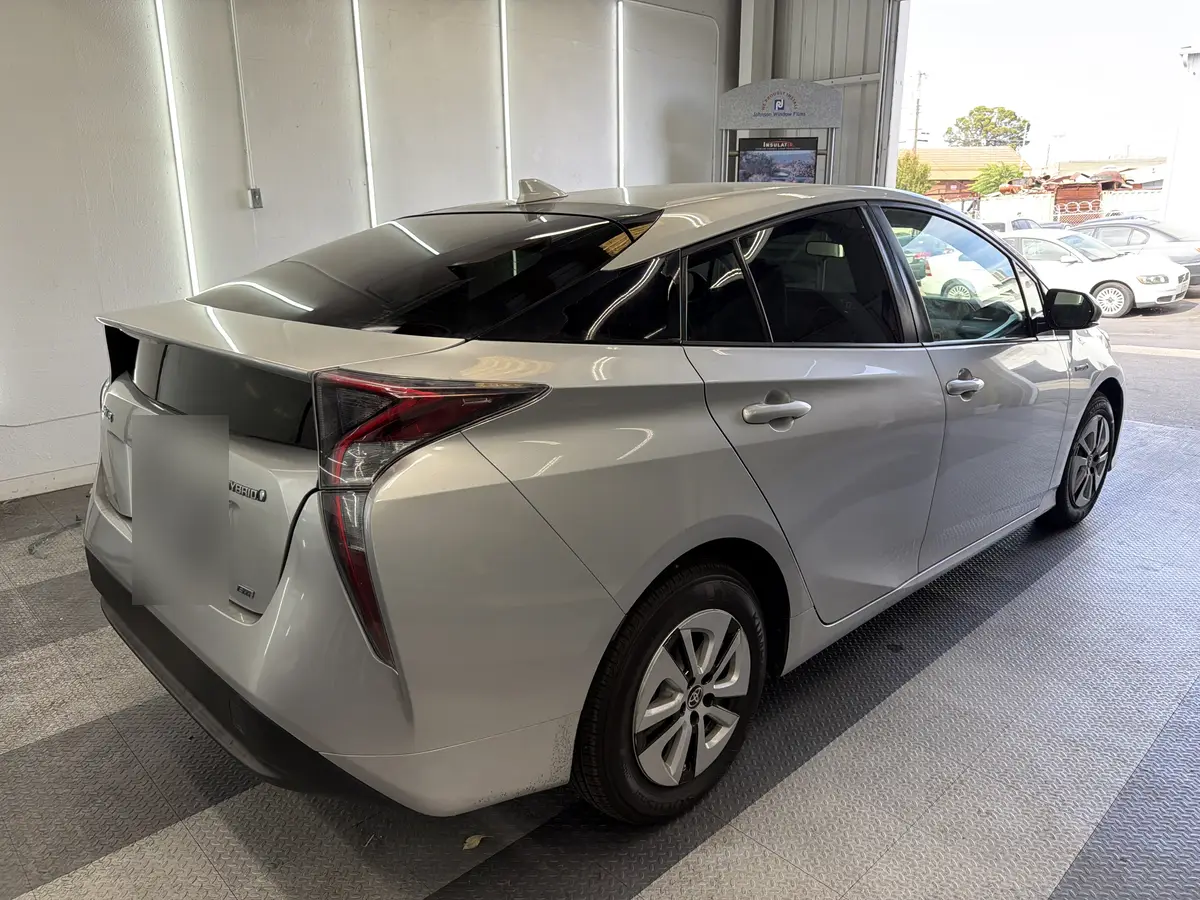 Silver Toyota Prius after Avery Dennison Encore carbon window tint (view 2)