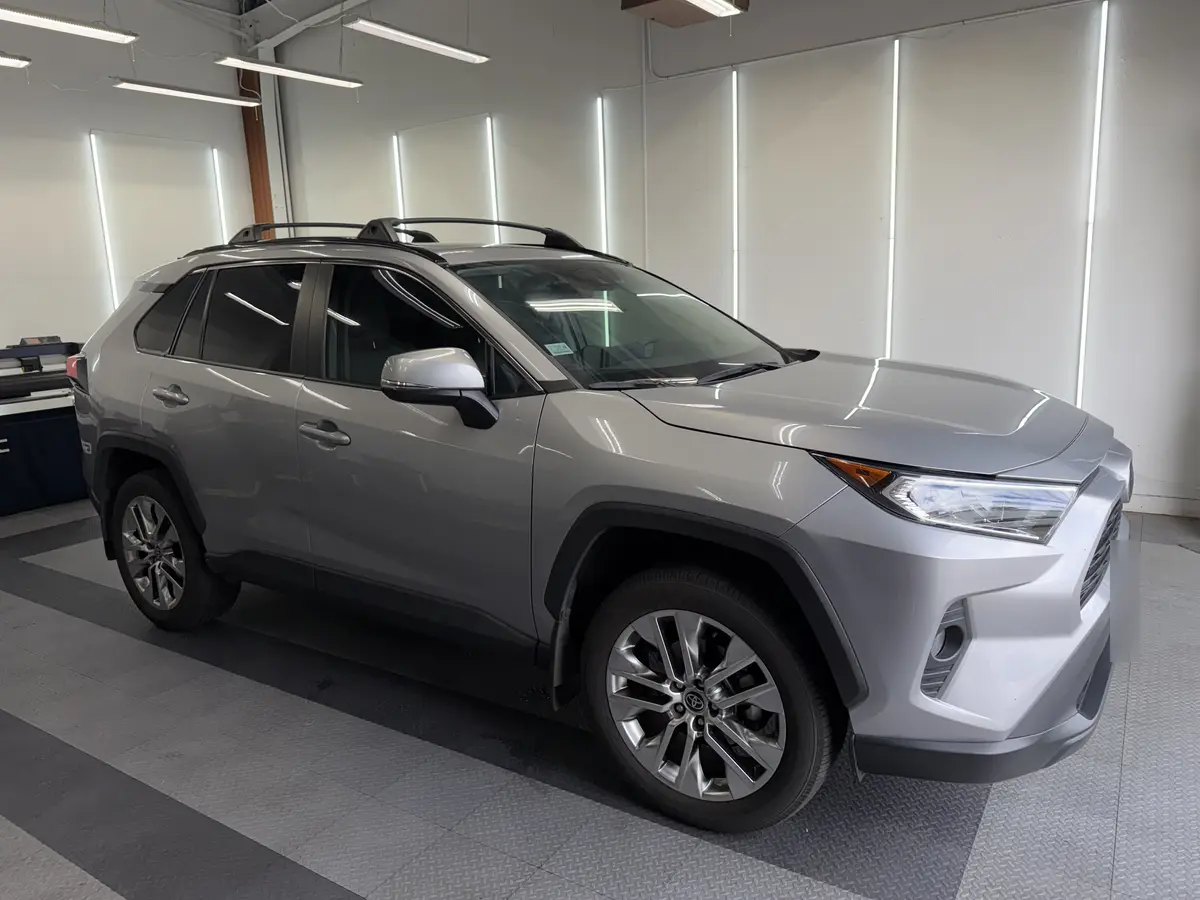 Silver Toyota RAV4 at Quality Window Tinting, carbon window tint job (photo 2)
