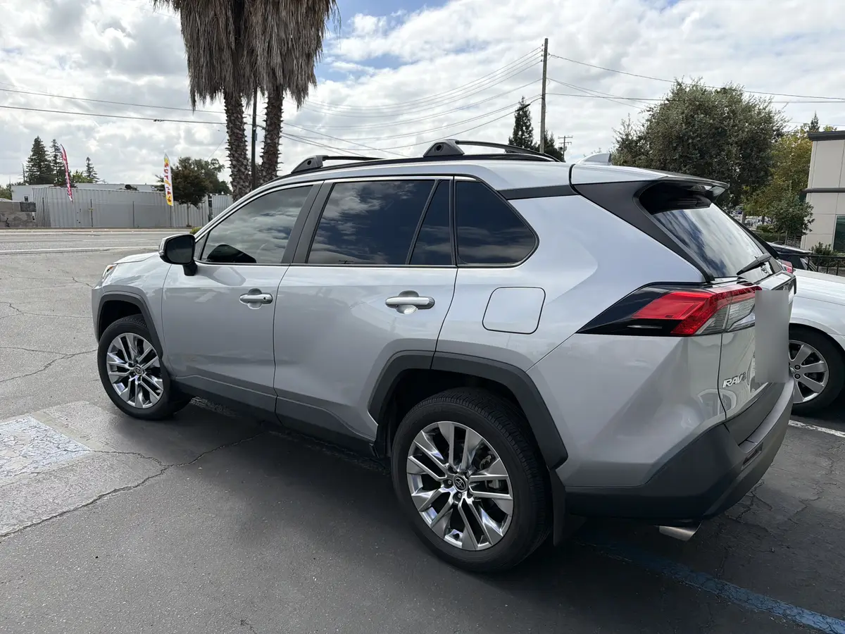 Silver Toyota RAV4 at Quality Window Tinting, carbon window tint job (photo 3)