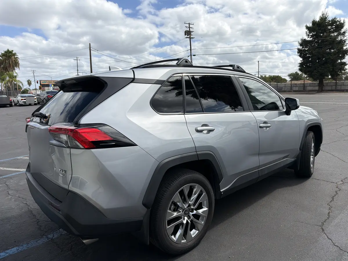 Silver Toyota RAV4 at Quality Window Tinting, carbon window tint job (photo 4)