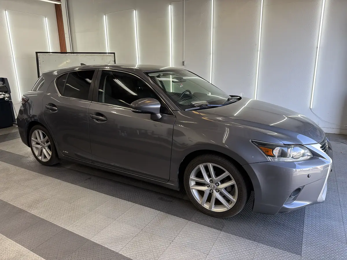 Gray Lexus CT 200h after Avery Dennison Encore carbon window tint (view 1)