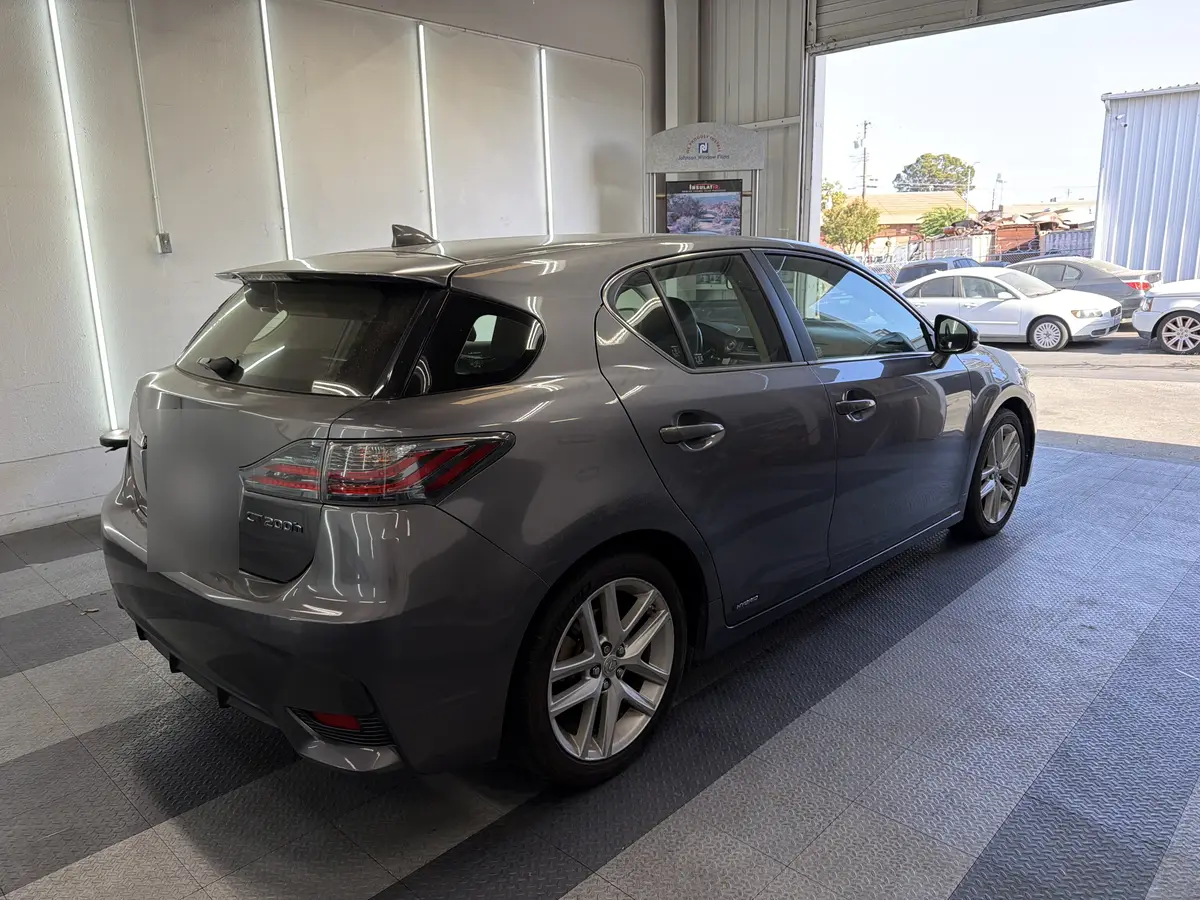 Gray Lexus CT 200h before window tinting, factory glass (view 1)