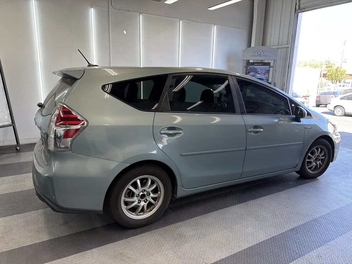 Blue Toyota Prius v after Avery Dennison Encore Supreme ceramic window tint (view 3)